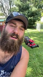 Guy with No Arms or Legs Pushing A Lawn Mower