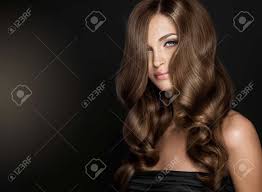 Hairstyles for long hair tutorial. Brunette Girl With Long And Shiny Wavy Hair Beautiful Model Stock Photo Picture And Royalty Free Image Image 74087062
