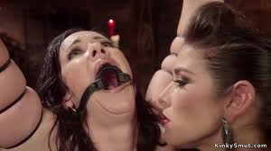 Big tits brunette dom whips ass to tied and ring gagged brunette lesbian  then fucks her - XNXX.COM