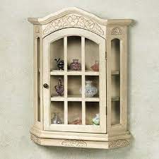 I wanted a wall mounted curio with a mirrored background in white for my daughter's swarovski collection. Fantastic Wall Mounted Curio Cabinet With Glass Doors Wall Curio Cabinet Glass Cabinet Doors Curio Cabinet