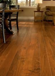 Brown Maple Hardwood Flooring In A Living Room This Massachusetts Home Showcases The Dark Stained C Maple Floors Maple Hardwood Floors Wood Floors Wide Plank