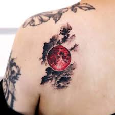 This is a beautiful, colorful moon tattoo. T0sa7ezvix6d1m