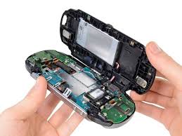 A ps vita card that contains an update file; Playstation Vita Rear Panel Replacement Ifixit Repair Guide