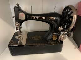 Image result for singer 28k