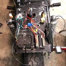 Started wiring up my bike from scratch with a Motogadget M Unit Blue.  Ignition, charging system, and starter are ready to go. This isnt the  final set up of course but the