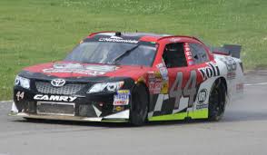 Bubba wallace, the only black driver in nascar, recently addressed the hesitancy of some of his fellow drivers to get vaccinated after receiving his doses and phelps said it was important for the company, the sport and the country. File 44 Carlos Contreras Drivers Side Rain Nascar Nationwide 2014 Gardner Denver 200 At Road America Jpg Wikipedia