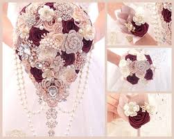 A copper pipe structure can be personalized with flowers and greenery to match your specific wedding vision—ask your venue or check local event rental companies to find one. Wedding Bouquet Rose Gold Burgundy Brooch Bouquet Etsy
