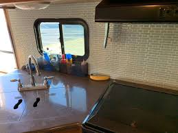 Peel and stick tile is marketed as the most straightforward tile to install because, as its name suggests, you simply peel and stick to install it. 17 Peel And Stick Kitchen Rv Backsplash Ideas The Crazy Outdoor Mama