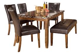 Table's rich, dark finish and clean, gently tapered profile is the epitome of great taste. Lacey Dining Table And 4 Chairs And Bench Set Ashley Furniture Homestore