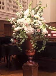 Wondering what style of flower bouquets you'll choose for your big day? Blush And White Altar Arrangement Designed By Www Labellablooms Com Large Flower Arrangements Large Floral Arrangements Altar Flowers