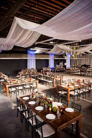 This Layout Creates Such A Comforting Feel And It S A Nice Change From The Classic Roun Warehouse Wedding Reception Wedding Reception Seating Wedding Ceiling