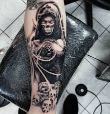 This grim reaper tattoo is dark and daring, just perfect for a bold man. 45 Grim Reaper Tattoo Design Ideas With Meaning