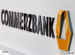 The commerzbank ag logo sits on an illuminated sign outside a bank branch as the bank's headquarters stand beyond at dusk in frankfurt, germany, on monday, feb. Commerzbank To Start Bailout Repayments Business Economy And Finance News From A German Perspective Dw 23 02 2011
