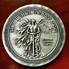 A Coin Featuring Saint Michael The Patron Saint Of Police Officers For The Nypd Patron Saints Coins St Michael