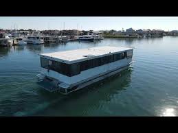 These houseboats may seem tiny, but you will be surprised when you see their interior! Video Custom Houseboat For Sale