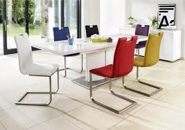 Run your hand along the beautiful solid wood tables and cabinets; Grande White Extending Table And 4 Chairs White Gloss Dining Table Comfortable Dining Chairs Cantilever Dining Chair