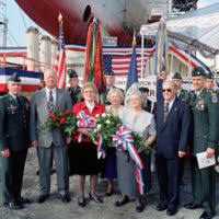 Capt. Richard Hayes III, commanding officer of Naval Facilities Engineering  Command (NAVFAC) Hawaii, presents the command's 2017 Employee of the Year  Awards to 6 individuals and one teamat Joint Base Pearl Harbor-Hickam. -