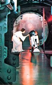 A New Hope Princess Leia And R2d2 When She Is Recording The Message To Go In R2d2 To Obi Wan Kenobi Begging Star Wars Poster Star Wars Wallpaper Star Wars Art