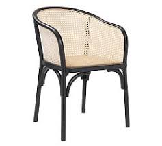 A stunning and elegant rattan dining chair, with a natural abaca weave and light coloured legs. Rattan Chairs Pottery Barn