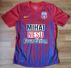 Bourceanu (fcsb) takes the corner. Fcsb Home Football Shirt 2012 2013 Sponsored By Mihai Nesu Foundation