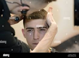 Cut hair too short -Fotos und -Bildmaterial in hoher Auflösung