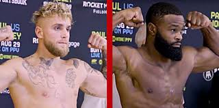 Jake paul and tyron woodley pose for media during a press conference before their cruiserweight fight at the novo by microsoft at l.a. E 0m19inethxrm