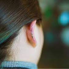 Flower Tattoo On The Ear Tattoo Artist Nando Hidden Tattoos Helix Ear Tattoo Helix Tattoo