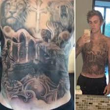 Moreover, in order to express his faith and the fact that he is searching for a purpose, he got a face tattoo that is barely noticeable; Justin Bieber Bilder Fur Die Ewigkeit Stars Und Ihre Tattoos
