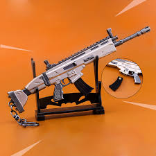 Our guide to the best weapons in fortnite breaks down rarity types and what they mean, the most effective arms in each weapon category and. Fortnight Battle Royale Game Keychain Alloy Scar Rifle Weapons Toy Kids Birthday Ebay