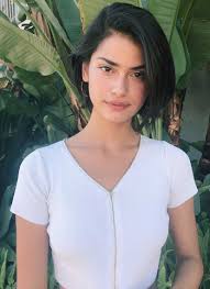 Whether your hair has natural curls or you are a fan of perms, a short and wavy layered look like style your hair with the bangs brushed forward in a side sweep to keep your cut flirty, feminine and anything but boyish. 14 Beautiful Short Dark Hairstyles You Can Try Today