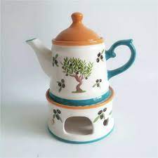 Maybe you would like to learn more about one of these? Bsci Approved Factory New Products Ceramic Clay Tea Pot And Teapot Warmer Set Custom Teapot With Candle Heating Buy Funky Ceramic Teapot Ceramic Teapot Warmer Custom Teapot With Warmer Product On Alibaba Com
