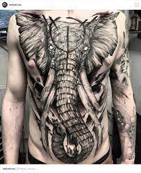 Pin By Yura Shahov On For Man Elephant Tattoos Torso Tattoos Chest Piece Tattoos
