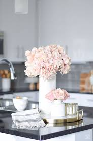 Beside the function components, a beautiful kitchen island with seating can give your kitchen a look of special and elegance. The Best Faux Flowers How To Style Them Where To Buy Them Faux Flowers Spring Kitchen Decor Kitchen Flower Arrangements