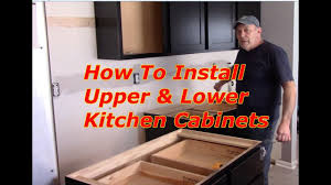Cabinet installation involves a lot of prep, but if you have a plan, organizational skills and help, you can put in kitchen cabinets easily and quickly. How To Install Kitchen Cabinets Youtube