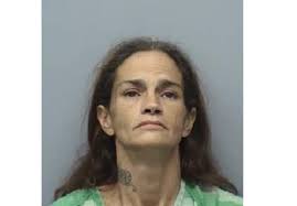 Woman facing new charge in convenience store shooting