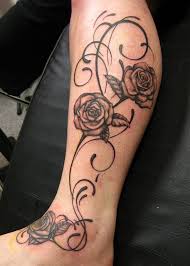 A vibrant red rose tattoo between the shoulders. Tattoos Of Roses With Dark Lines Recent Photos The Commons Getty Collection Galleries World Map App Leg Tattoos Women Best Leg Tattoos Leg Tattoo Men