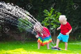 Lastly, make sure to adjust the watering based on the weather. Child Playing With Garden Sprinkler Preschooler Kid Running And Jumping Summer Outdoor Water Fun In The Backyard Children Play With Hose Watering Flowers Kids Run And Splash On Hot Sunny Day Stock