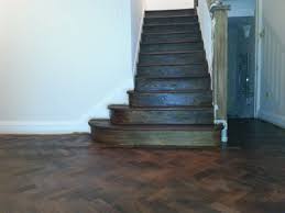 Lighter floors can be better for small dark rooms as they will brighten them up, making them look bigger because they reflect light. Renovation Staining Of Herringbone Real Wood Flooring Watford
