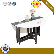 A dining table to go with your folding chairs? China Modern Latest Design Dining Room Furniture Round Folding Dining Table With Wheels China Dining Furniture Hotel Furniture