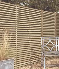 Fence is connected to both sides of the pole. Venetian Panel Hartwells Fencing