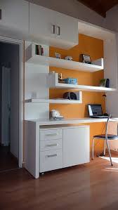 The floating shelves are perfect will surely beautify your home and will work as a perfect decorative accent in the place. Modern Home Office White Desk Floating Shelves Orange Wall Behind Minimalist Furniture Design Minimalist Furniture Minimalist Home