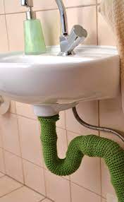 11 Brilliant Solutions To Make Exposed Pipes Chic Hide Pipes Basement Decor Exposed Plumbing