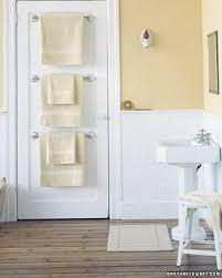 Hanging Towels In A Small Bathroom With Not A Lot Of Wall Space Tiny Bathroom Small Bathroom Bathroom Doors