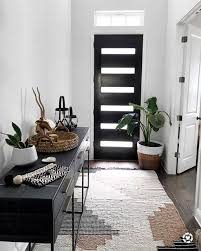 8 Eminent Entryway Table Ideas To Make An Aesthetic Appeal Momo Zain Black Console Table Entryway Table Decor Entryway Table Modern