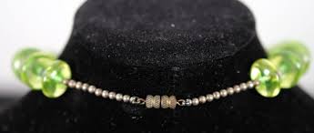 It's probably safe to handle normally, but faceting it might be another matter. Lot Vintage Uranium Vaseline Glass Bead Necklace
