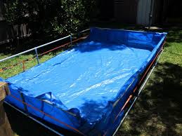 Giant Diy Paddling Pool In Backyard The Dirt Effect Pool Slide Diy Diy Pool Homemade Swimming Pools