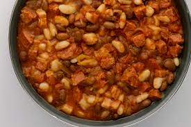In a large skillet, cook and crumble sausage over medium heat until no longer pink; Slow Cooker Baked Beans With Beef And Sausage Recipe