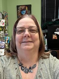 Black necklace with green shirt