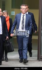 Metropolitan Police's Superintendent Andrew Johnstone leaving Westminster  Magistrates' Court, London where he was accused of charging into Chief  Inspector Penny Mills' right shoulder as he went to leave a senior  officers' promotion workshop at New ...