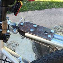 Bike Trailer Hitch Using A Wheel Caster 1 4 U Bolts And Railroad Spike Bike Trailer Trailer Hitch Bike Trailer Hitch